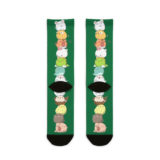 Green crew socks with colorful stacked cartoon animal print, featuring cute kawaii animal designs for all-over sublimation.