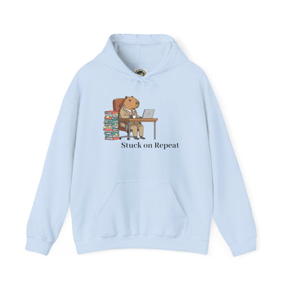 Capybara in Suit 'Stuck on Repeat' hoodie featuring a printed capybara graphic on a comfortable hoodie by Printify.