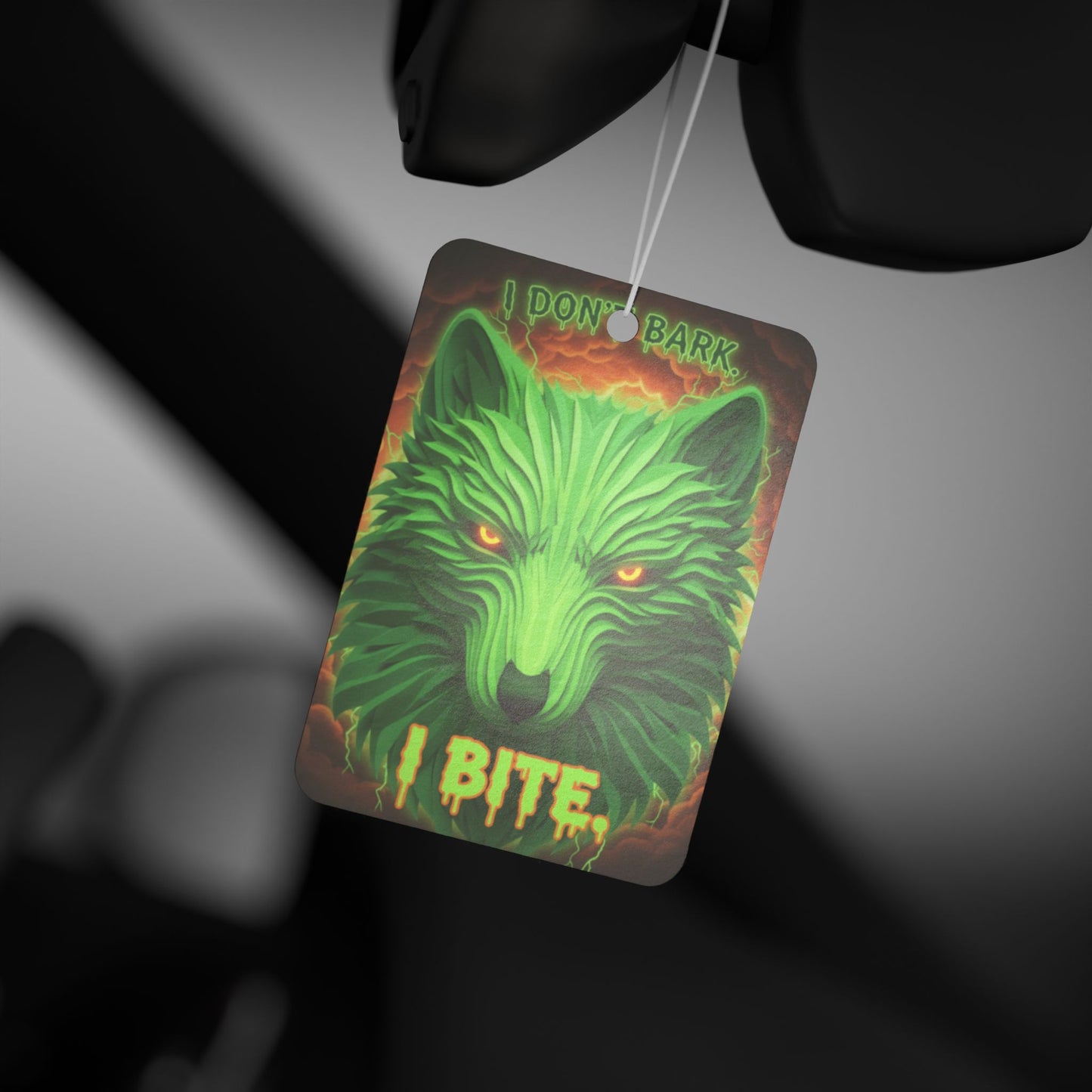Neon wolf car air freshener with "I Don't Bark I Bite" text, vibrant colors, and printed accessories design.