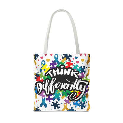 Colorful puzzle ribbon design on Think Differently Autism Awareness tote bag by Printify. Ideal for everyday use.