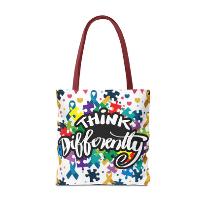 Colorful puzzle ribbon design on Think Differently autism awareness tote bag by Printify, showcasing vibrant artwork.