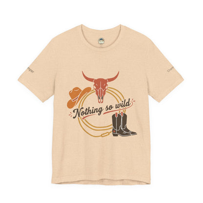 Personalized Nothing So Wild Rider Western sunset T-shirt with cowboy graphic, casual fit, and vibrant sunset design by Printify.