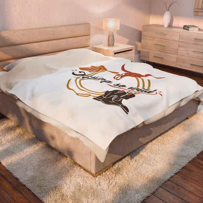 Velveteen plush blanket with cowboy chic western desert print by Printify, featuring all-over desert landscape design.