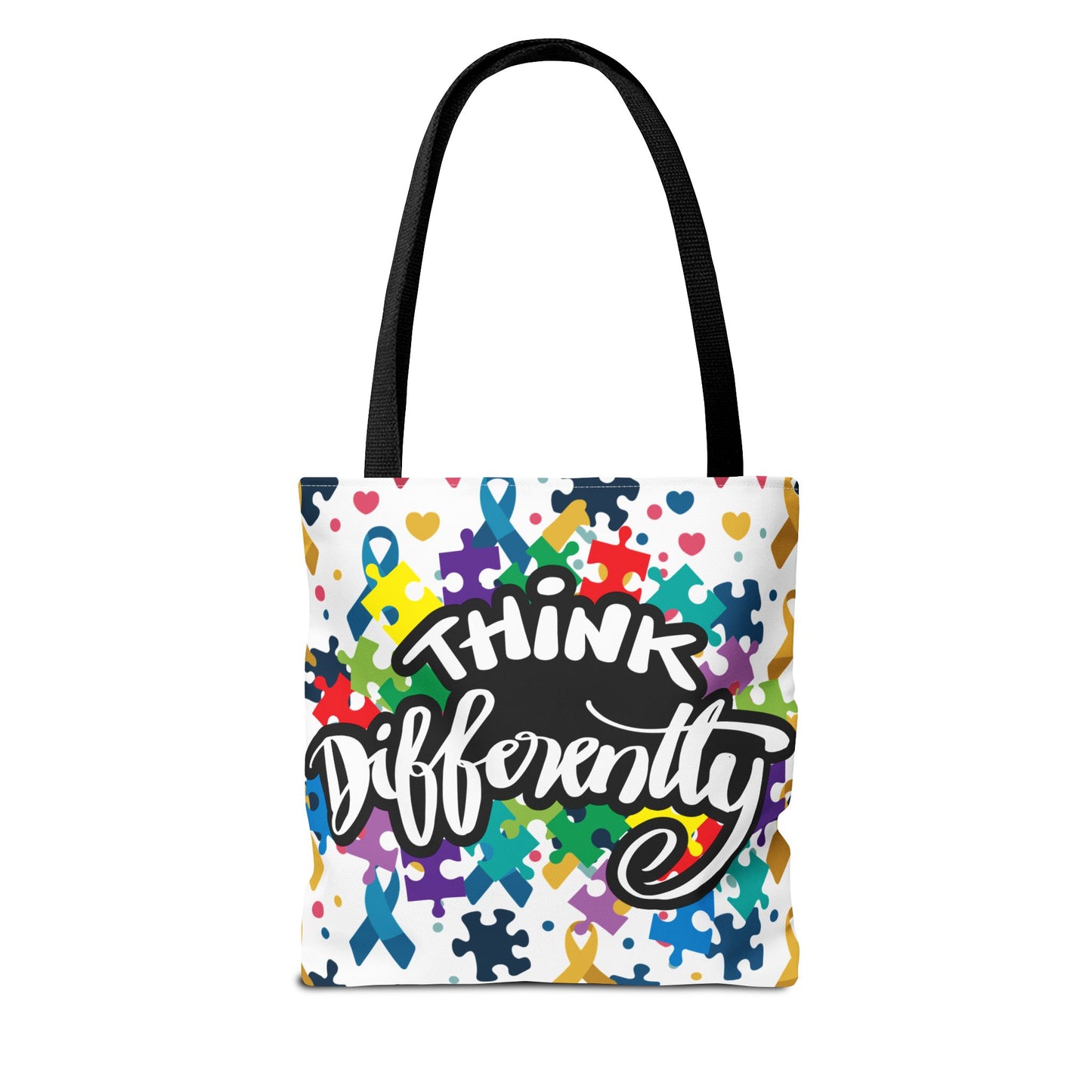 Colorful puzzle ribbon design on the Think Differently Autism Awareness Tote Bag by Printify, showcasing vibrant artwork.