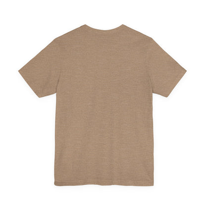 Gray T-shirt featuring a cartoon capybara in a suit with "Stuck on Repeat" text and space for a personalized nameplate print.