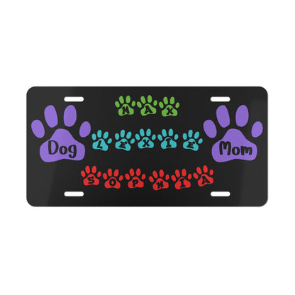 Colorful personalized dog mom paw print vanity license plate by Printify featuring vibrant paw print design for pet lovers.