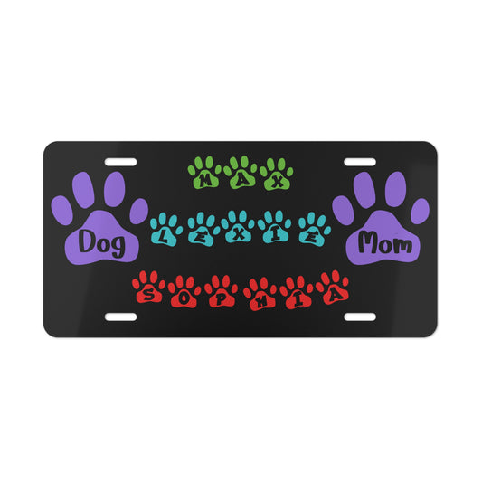 Colorful personalized dog mom paw print vanity license plate by Printify featuring vibrant paw print design for pet lovers.