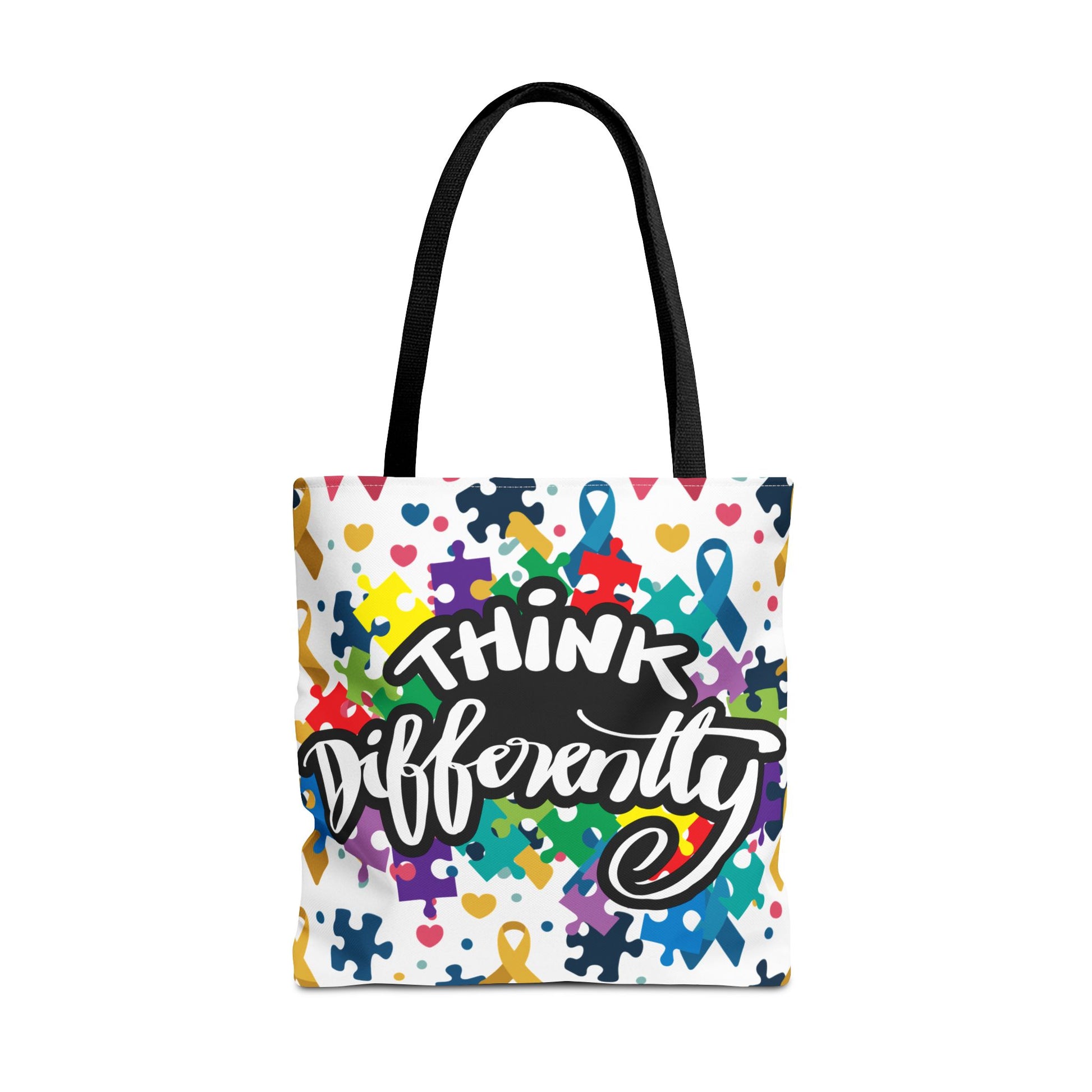 Colorful puzzle ribbon design on a Think Differently Autism Awareness tote bag by Printify.