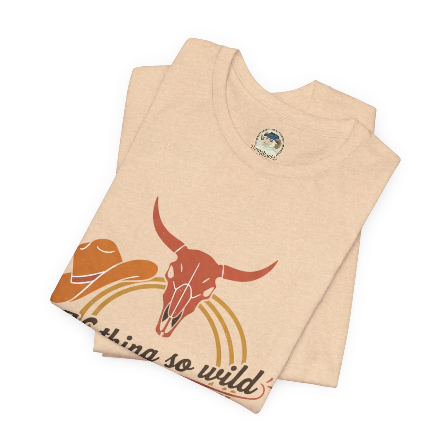 Personalized western sunset print T-shirt from Nothing So Wild Rider Tee collection, featuring a vibrant sunset design.