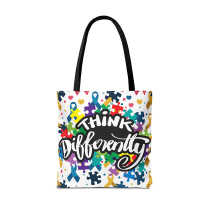 Colorful puzzle ribbon design on Think Differently Autism Awareness Tote Bag by Printify, showcasing vibrant AOP style.