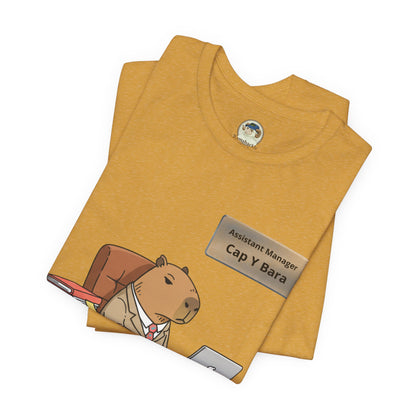 Gray T-shirt featuring a capybara in a suit with "Stuck on Repeat" and customizable nameplate design, from Printify.