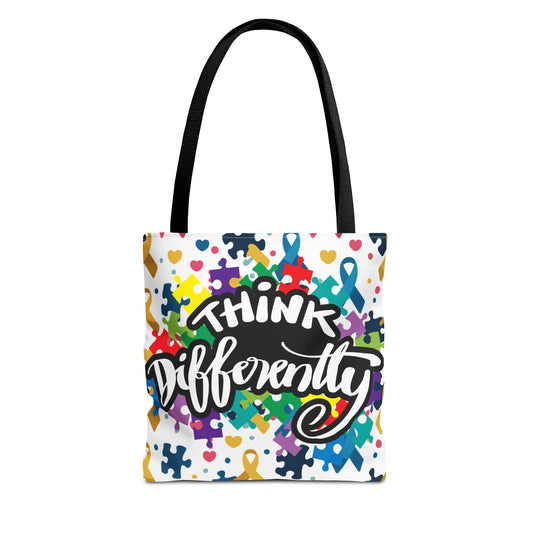 Colorful puzzle ribbon design on Think Differently Autism Awareness tote bag by Printify, showcasing vibrant artwork.
