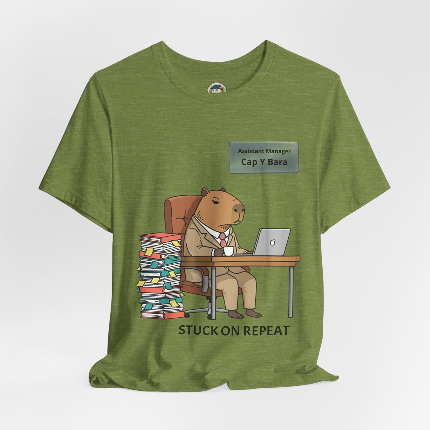 Gray T-shirt featuring a playful capybara in a suit graphic, with "Stuck on Repeat" and personalized nameplate design.