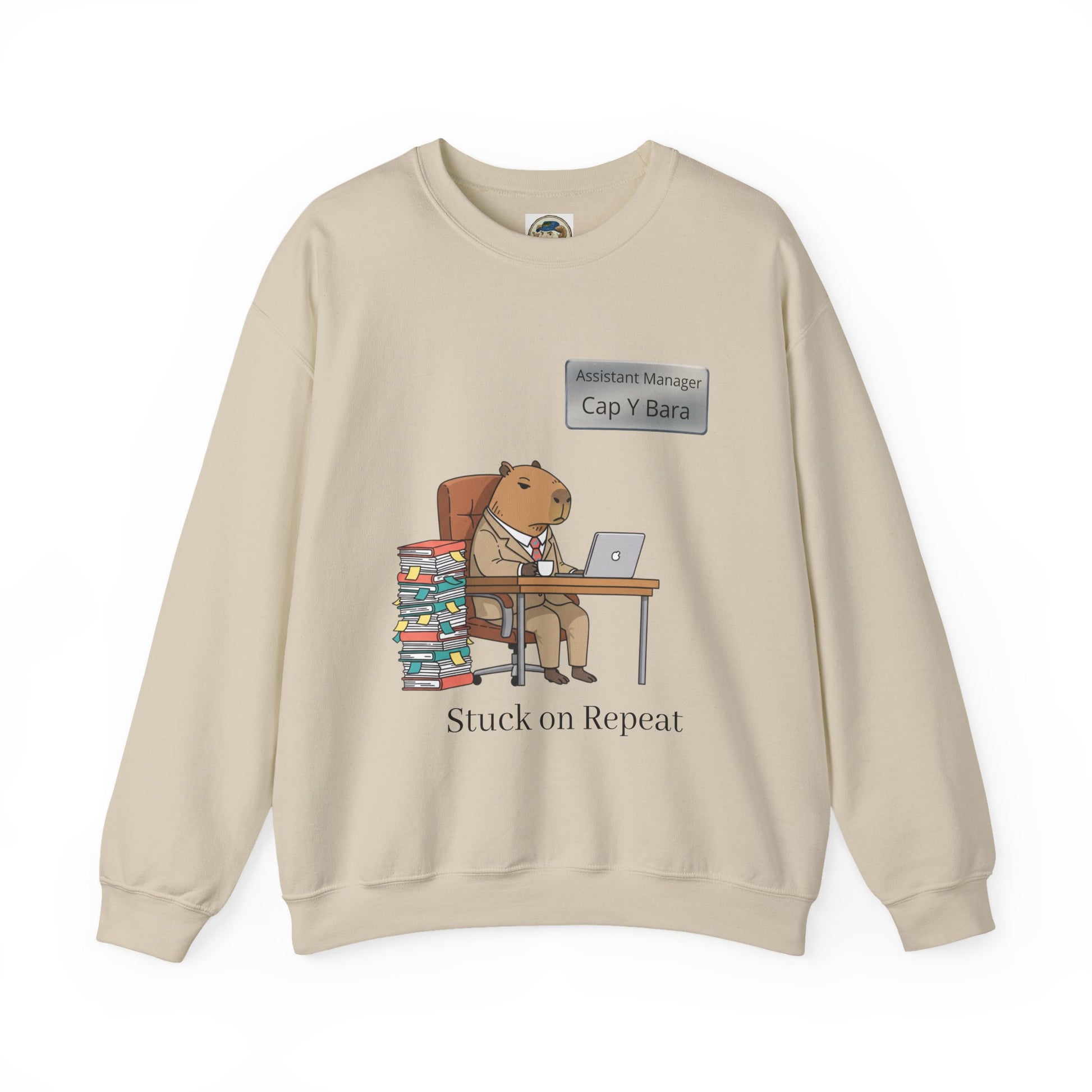 Gray sweatshirt featuring an illustration of an office capybara at a desk, representing adulting and animal bureaucracy.