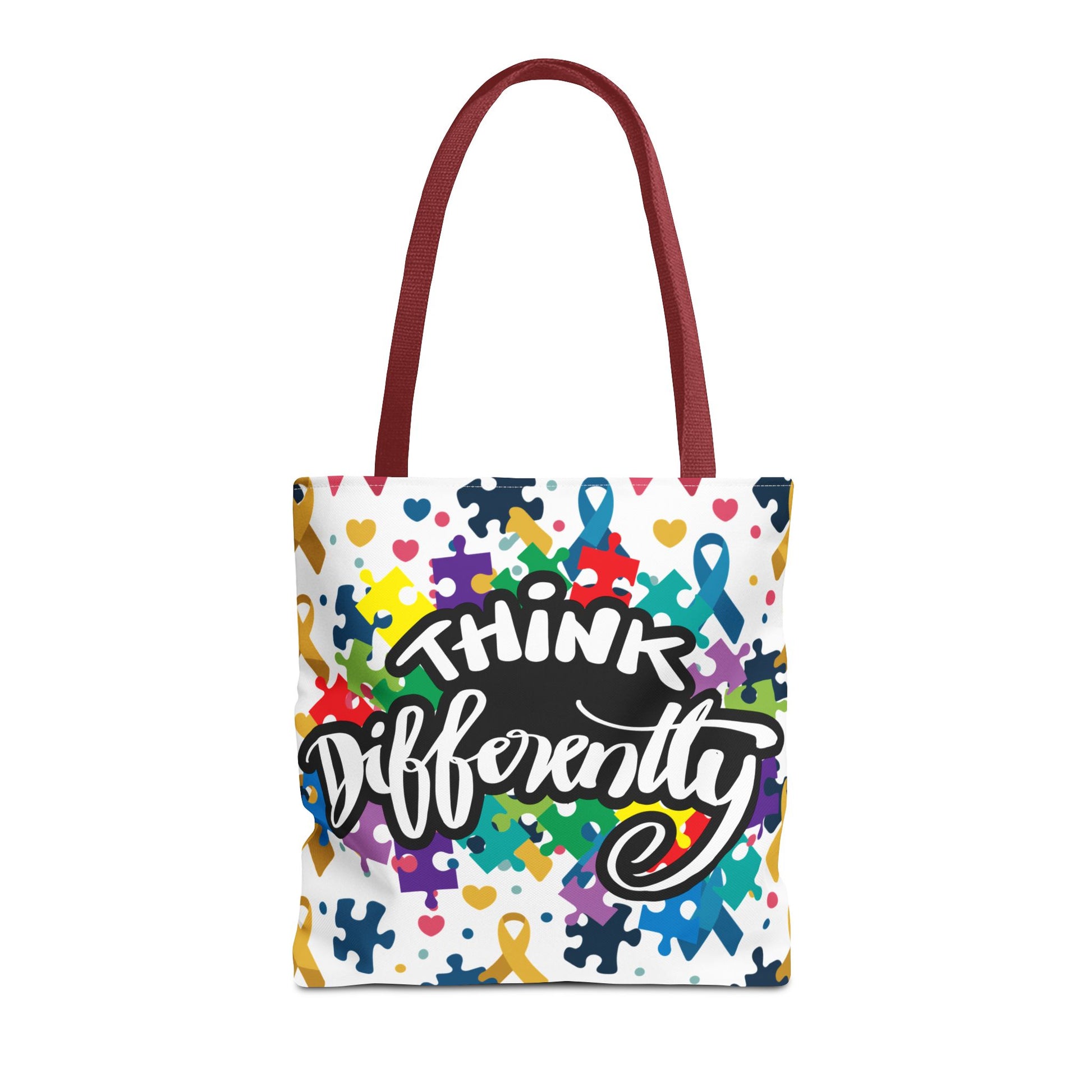 Colorful puzzle ribbon design on Think Differently Autism Awareness Tote Bag by Printify. Stylish and vibrant AOP tote.