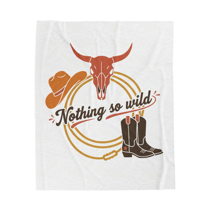 Velveteen plush blanket with western desert print by Nothing So Wild, featuring cowboy chic all-over pattern in muted tones.