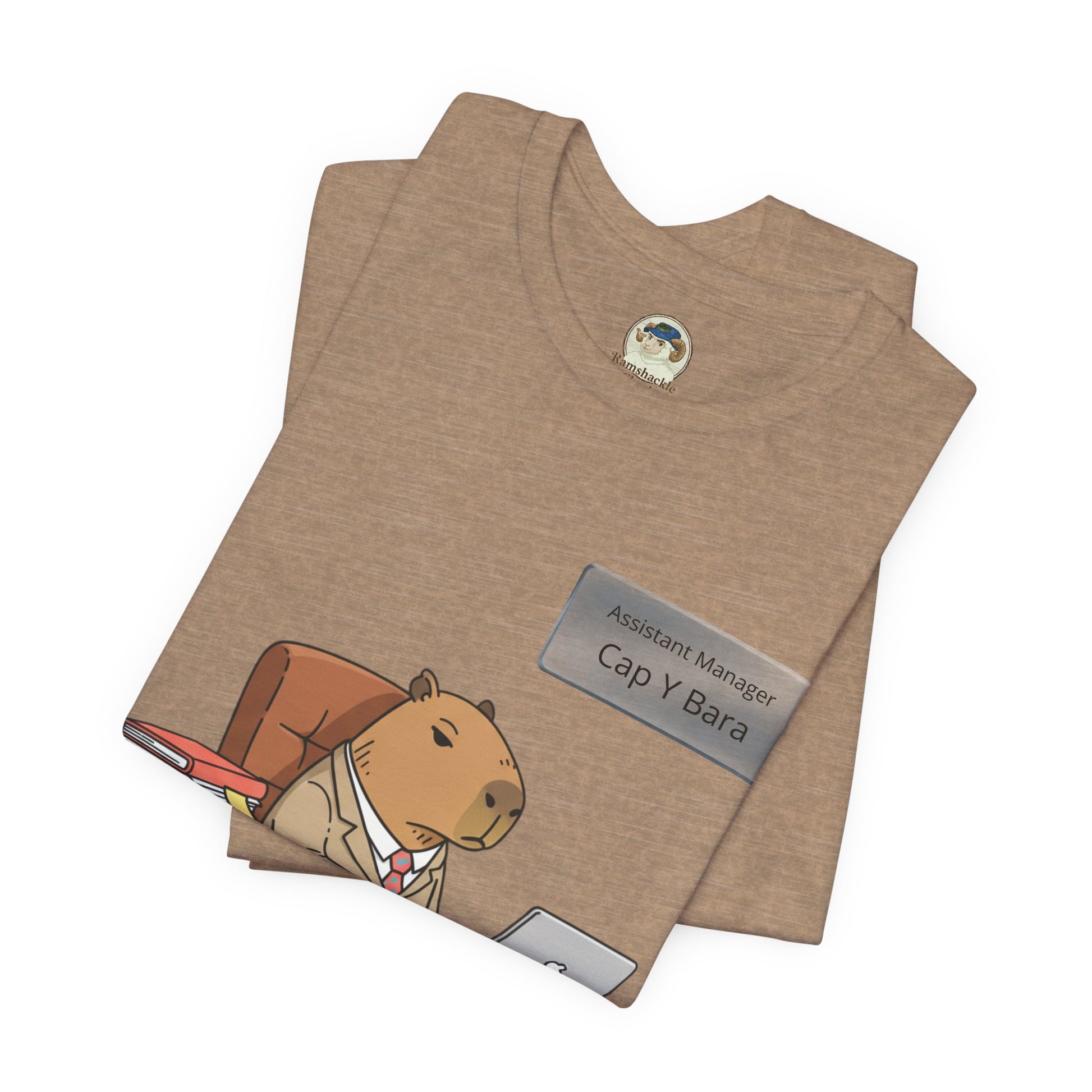 Printed T-shirt featuring a capybara in a suit with "Stuck on Repeat" text and personalized nameplate design.