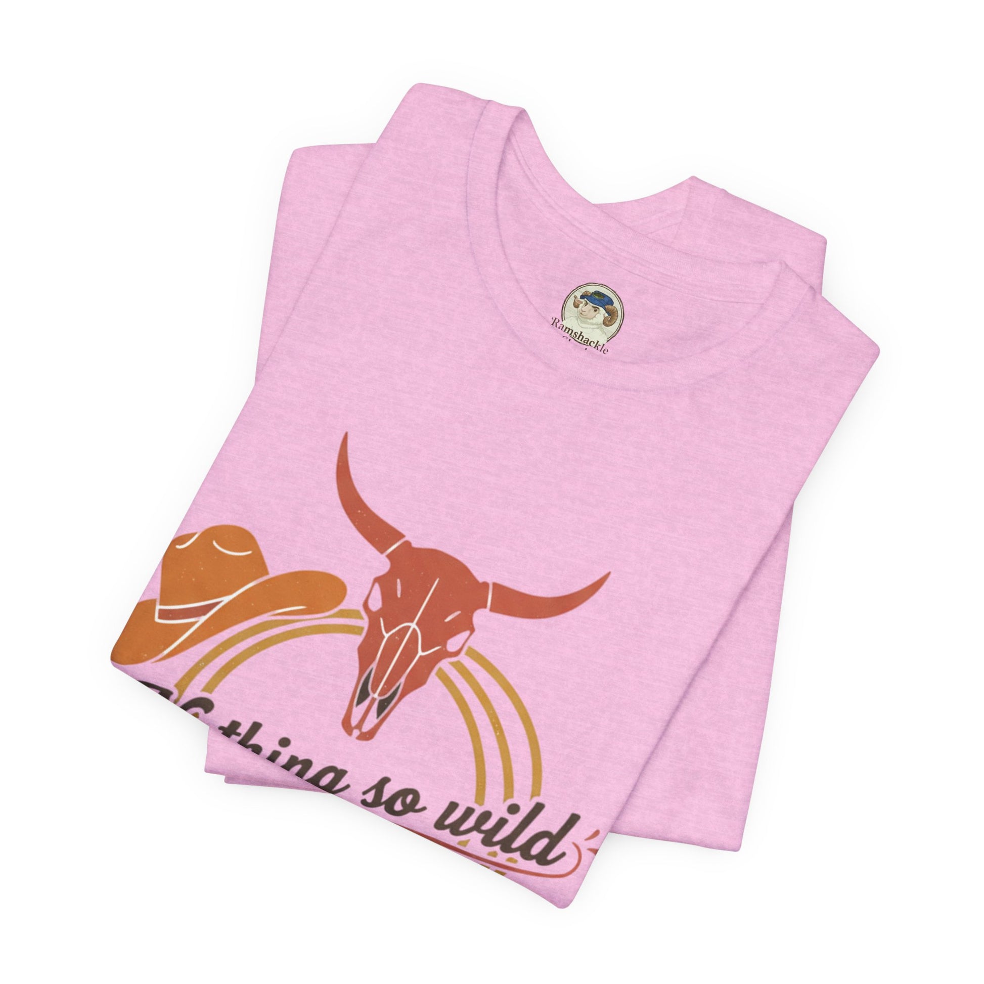 Personalized Western sunset T-shirt featuring the Nothing So Wild Rider design, made by Printify, with vibrant sunset and cowboy motif.