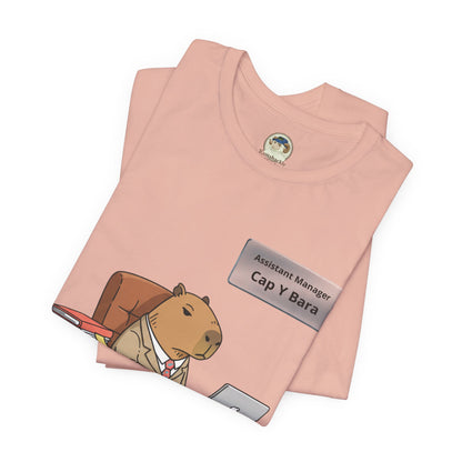 Capybara in suit desk tee featuring "Stuck on Repeat" personalized nameplate design on a casual T-shirt.