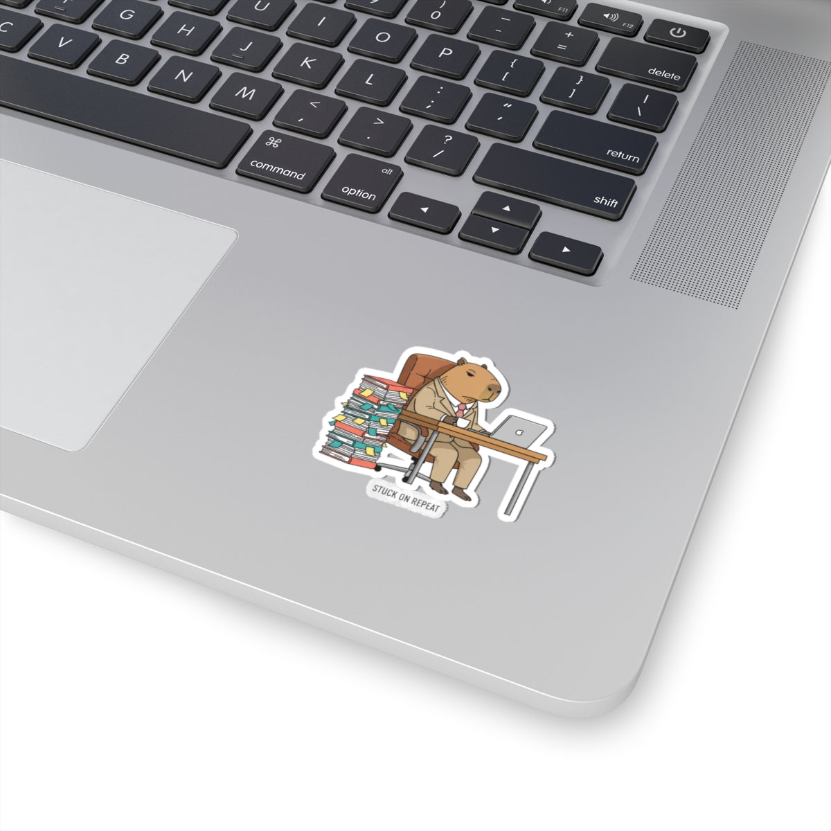 Stuck on Repeat Capybara Office Sticker featuring an adulting animal illustration, ideal for decorating notebooks or laptops.