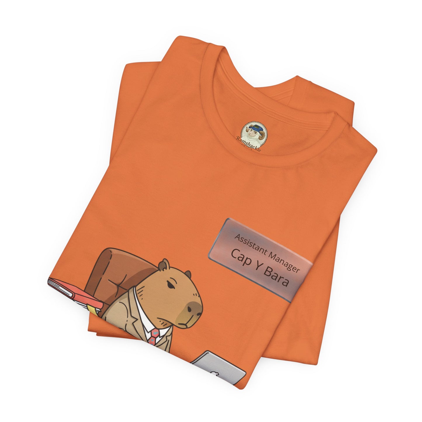 Custom "Stuck on Repeat" Capybara in Suit Desk T-Shirt by Printify featuring personalized nameplate design on a casual tee.
