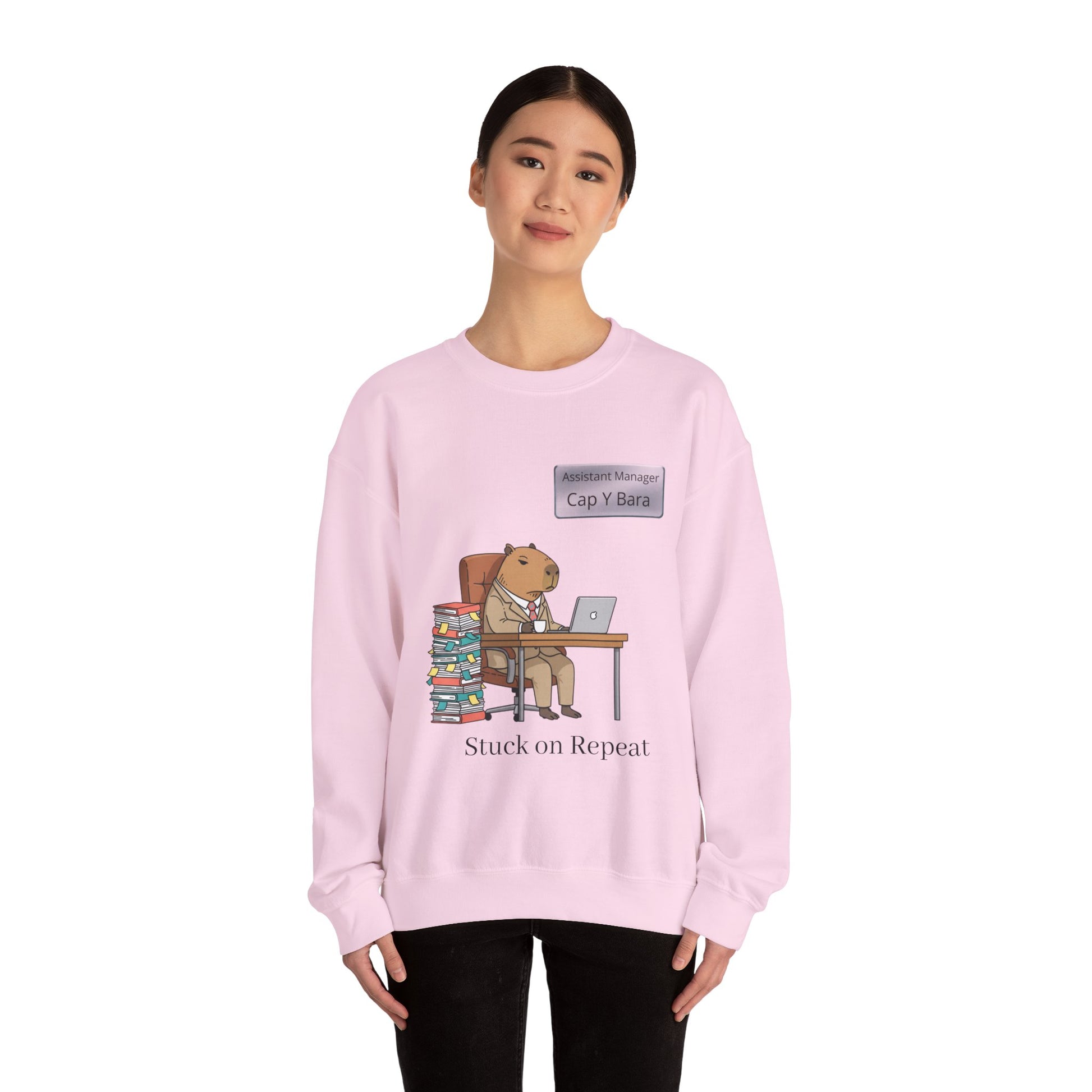 Gray sweatshirt featuring an illustration of an office capybara at desk from the Unhinged Animal Bureaucracy collection.