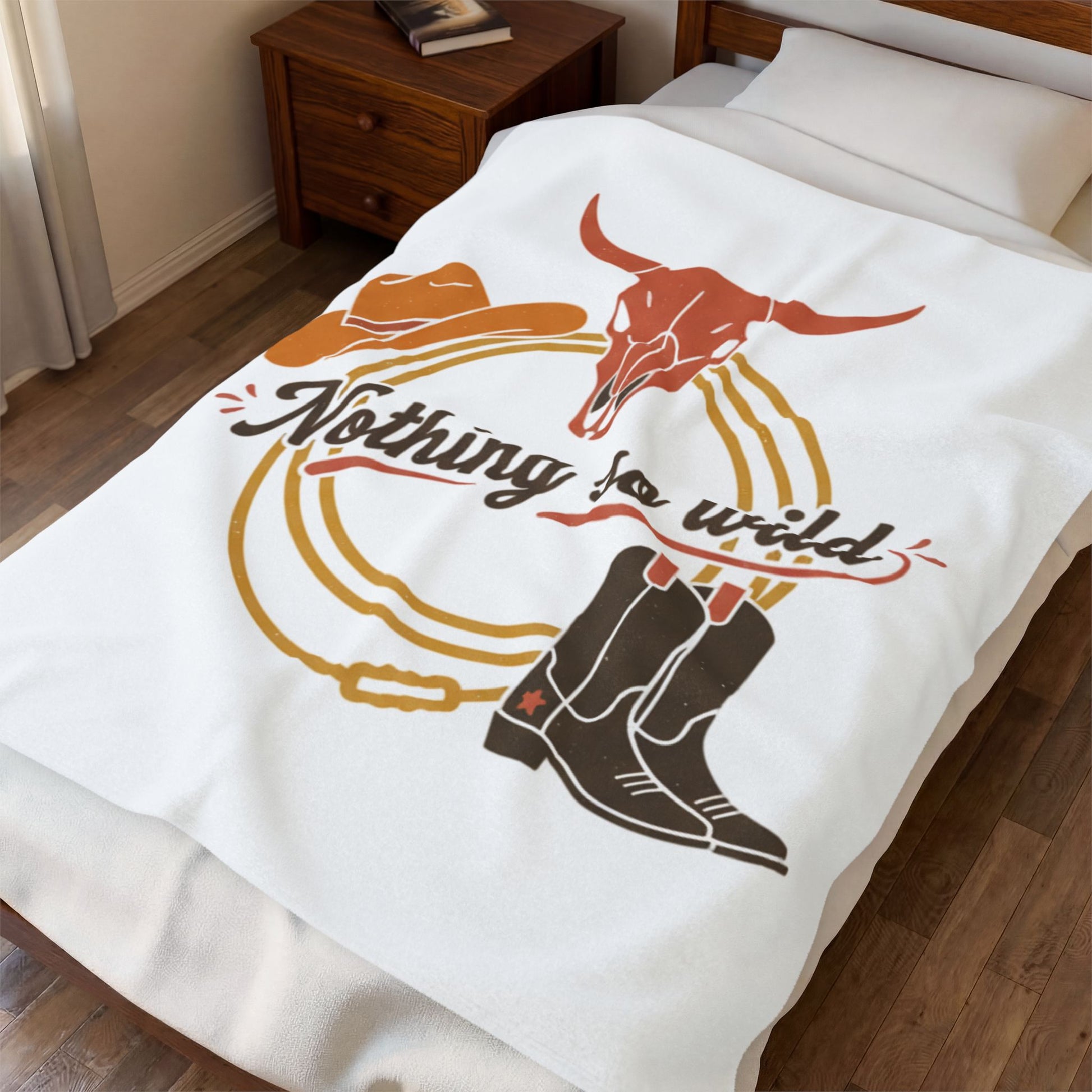 Soft velveteen plush blanket with cowboy chic western desert print, featuring all-over desert landscape and minimal Western design.