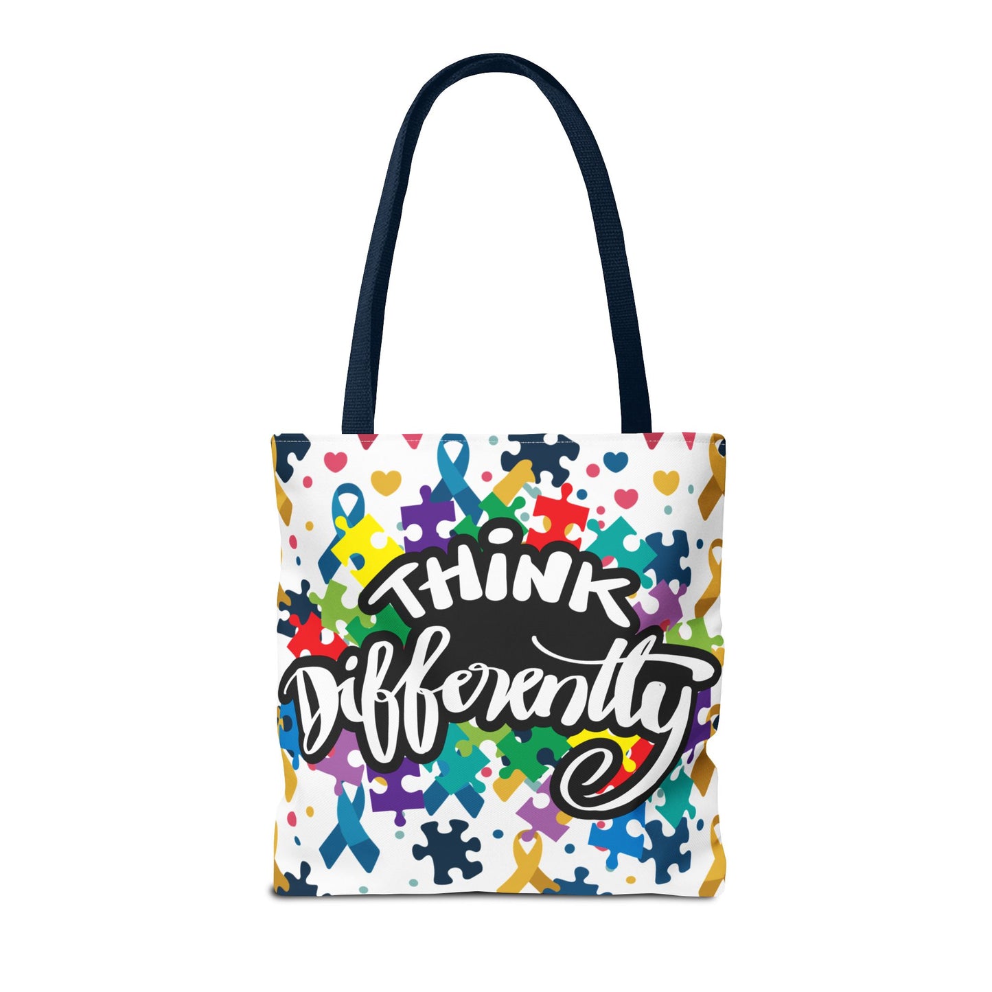 Colorful puzzle ribbon design on the Think Differently Autism Awareness tote bag by Printify, showcasing its vibrant pattern.