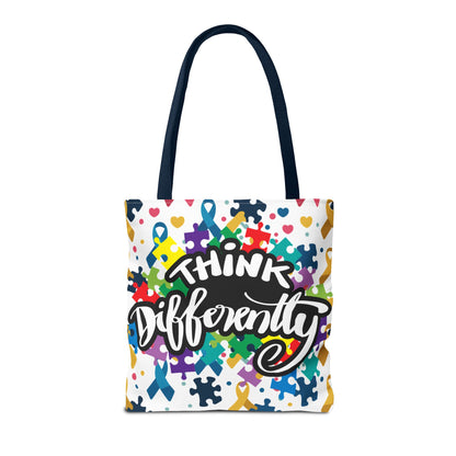 Colorful puzzle ribbon design on the Think Differently Autism Awareness tote bag by Printify, showcasing its vibrant pattern.