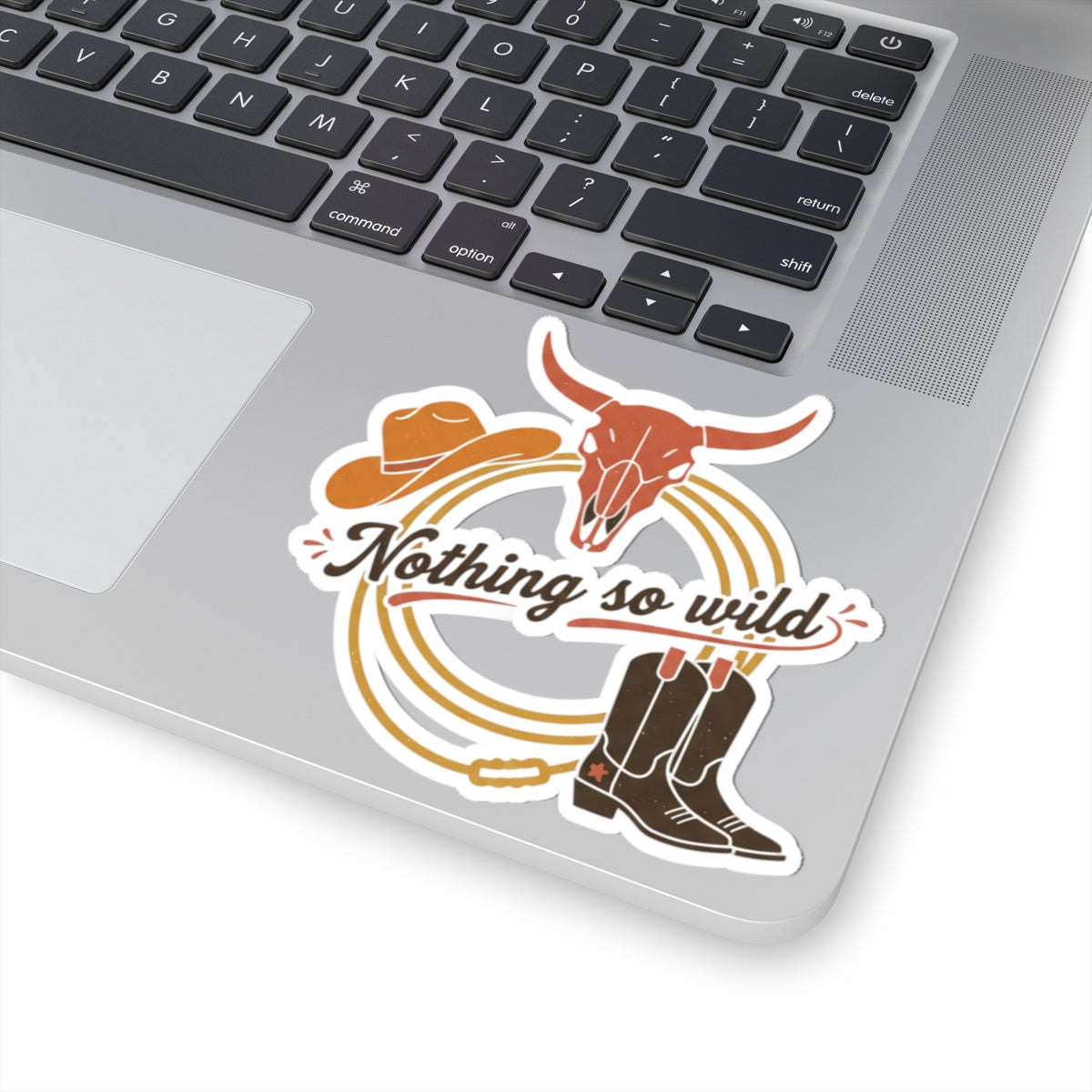 Minimal Western “Nothing So Wild” kiss-cut stickers featuring cowboy chic design with desert sunset, printed on paper by Printify.