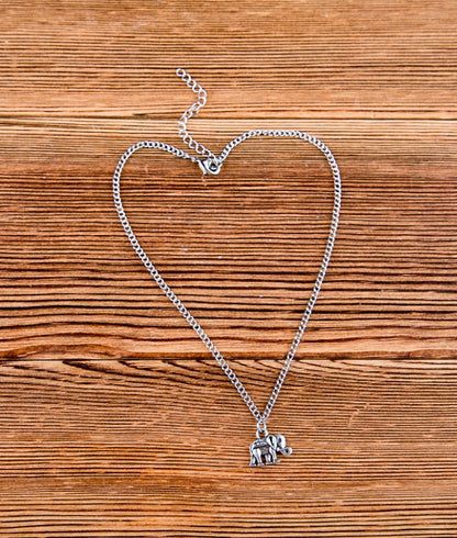 Vintage Zendrop elephant anklet and bracelet set featuring intricate metal charms and boho-inspired jewelry design.