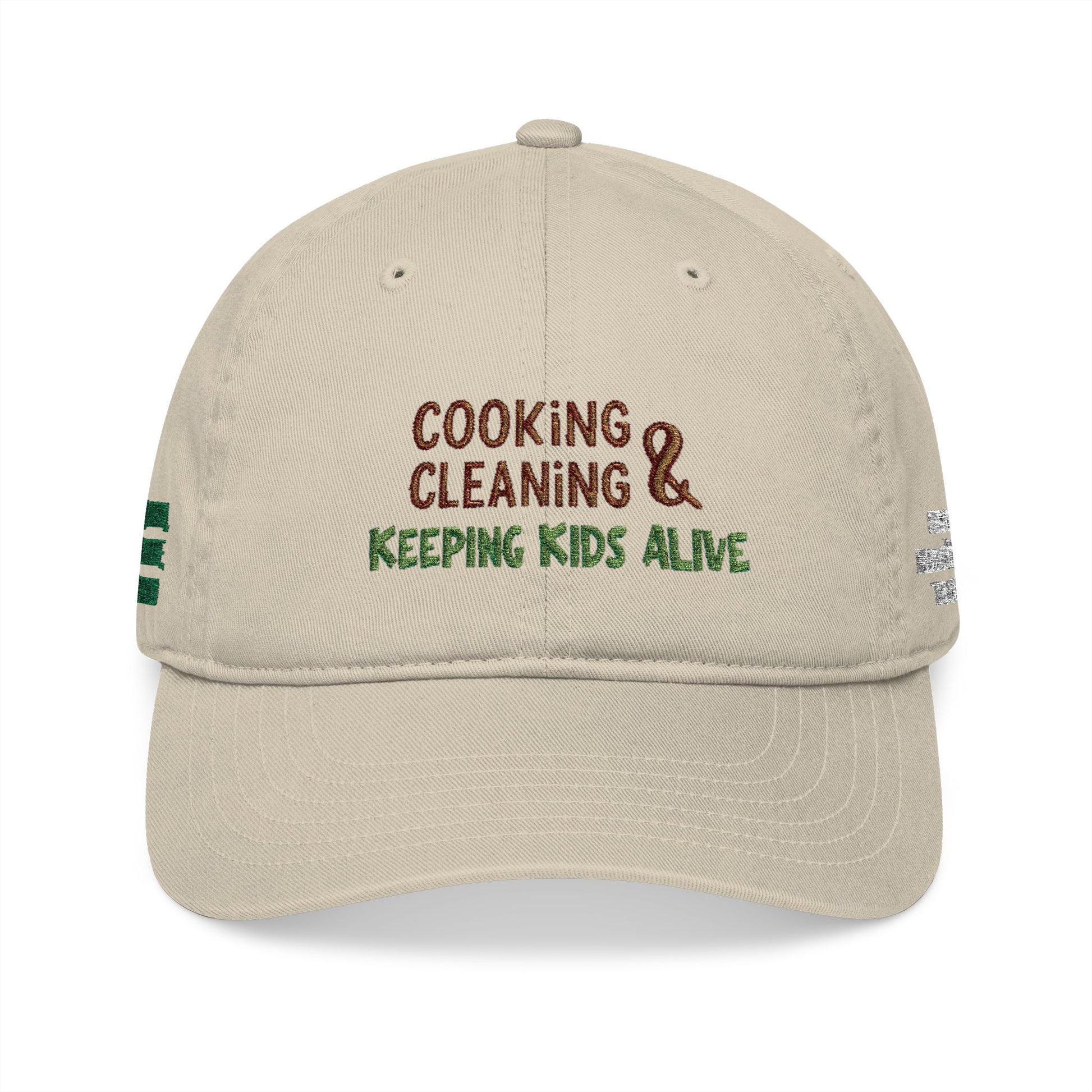 Organic baseball cap with custom embroidered name and playful "cooking, cleaning & keeping kids alive" message, casual hat for everyday wear.