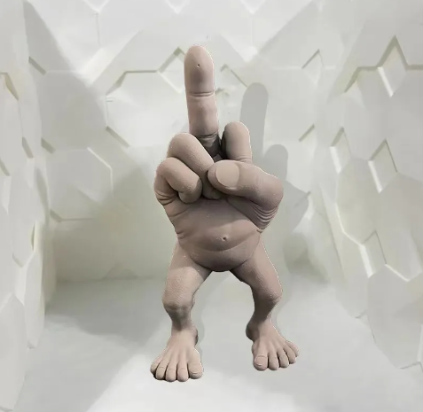 Zendrop middle finger hand figurine, detailed sculpture showing a hand with extended middle finger gesture on a plain background.