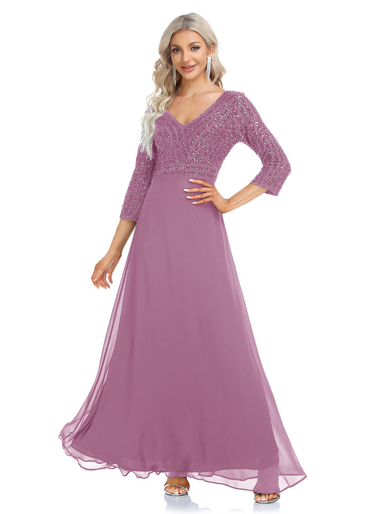 Women's sequined evening dress with chiffon V-neck by Ramshackle Shack, featuring sparkling sequins and flowing chiffon fabric.