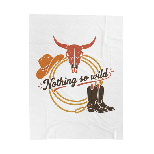 All-over printed Nothing So Wild velveteen plush blanket with cowboy chic desert western design, soft and cozy for warm comfort