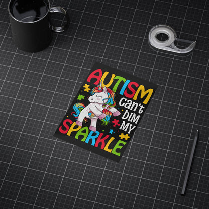 Autism Can't Dim My Sparkle print on paper product, colorful design celebrating autism awareness, by Printify.