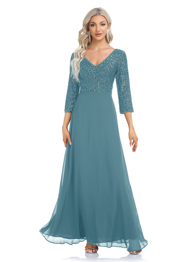 Women's sequined evening dress with chiffon V-neck by Ramshackle Shack, featuring sparkling sequins and flowing chiffon fabric.