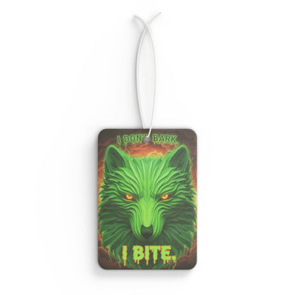 Neon wolf air freshener with "I Don't Bark I Bite" text, designed as a car accessory, featuring bright neon colors and a wolf graphic.