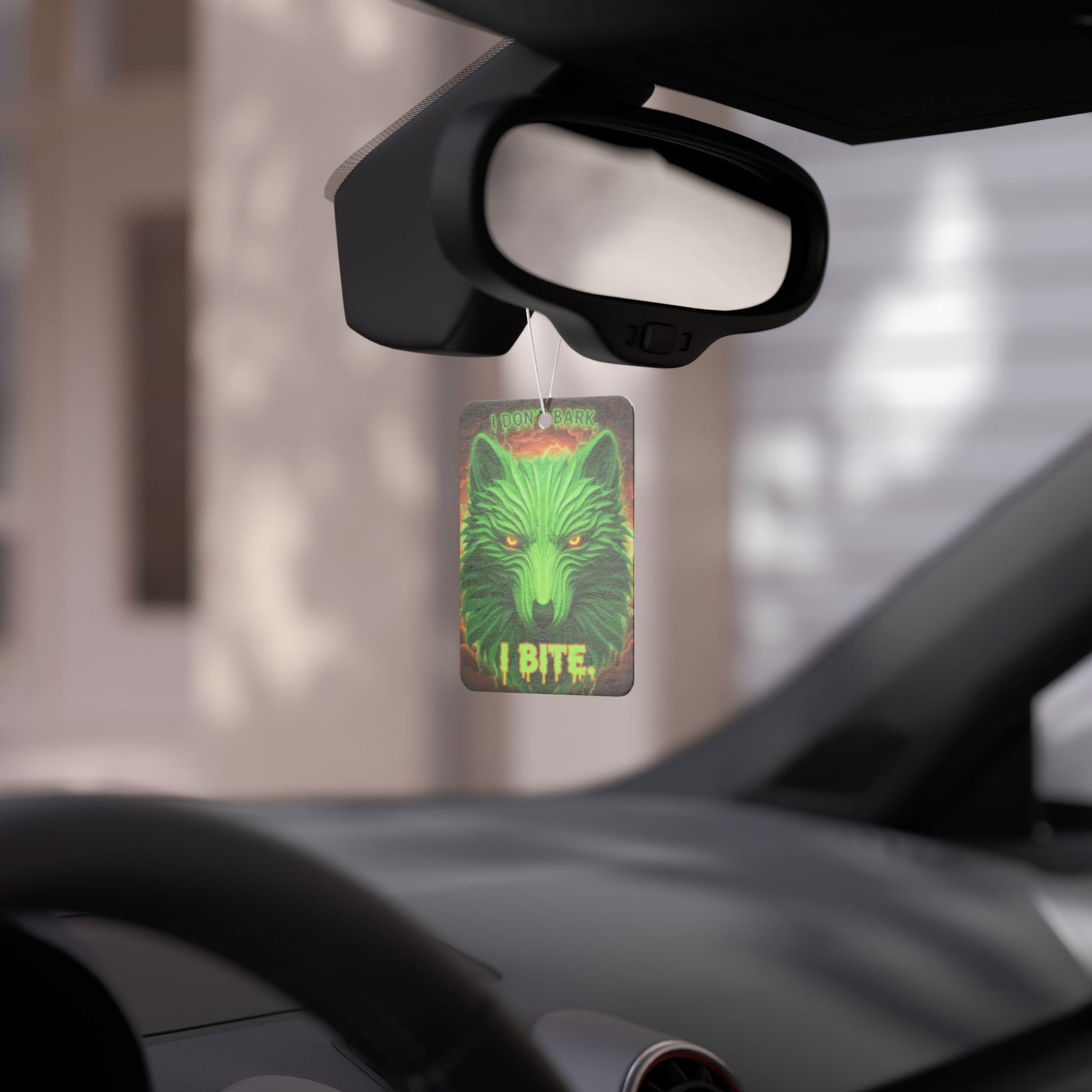 Neon wolf-shaped car air freshener with "I Don't Bark I Bite" text, accessory by Printify for vehicle interior decoration.