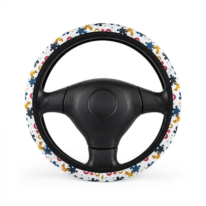 Autism Awareness Puzzle Piece steering wheel cover by Printify, vibrant fabric with colorful puzzle pattern for car accessories.