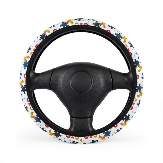 Autism Awareness Puzzle Piece steering wheel cover by Printify, vibrant fabric with colorful puzzle pattern for car accessories.