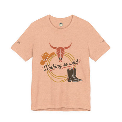 Personalized Western Sunset T-Shirt by Printify featuring a cowboy riding horse and vibrant sunset design on a casual T-shirt.