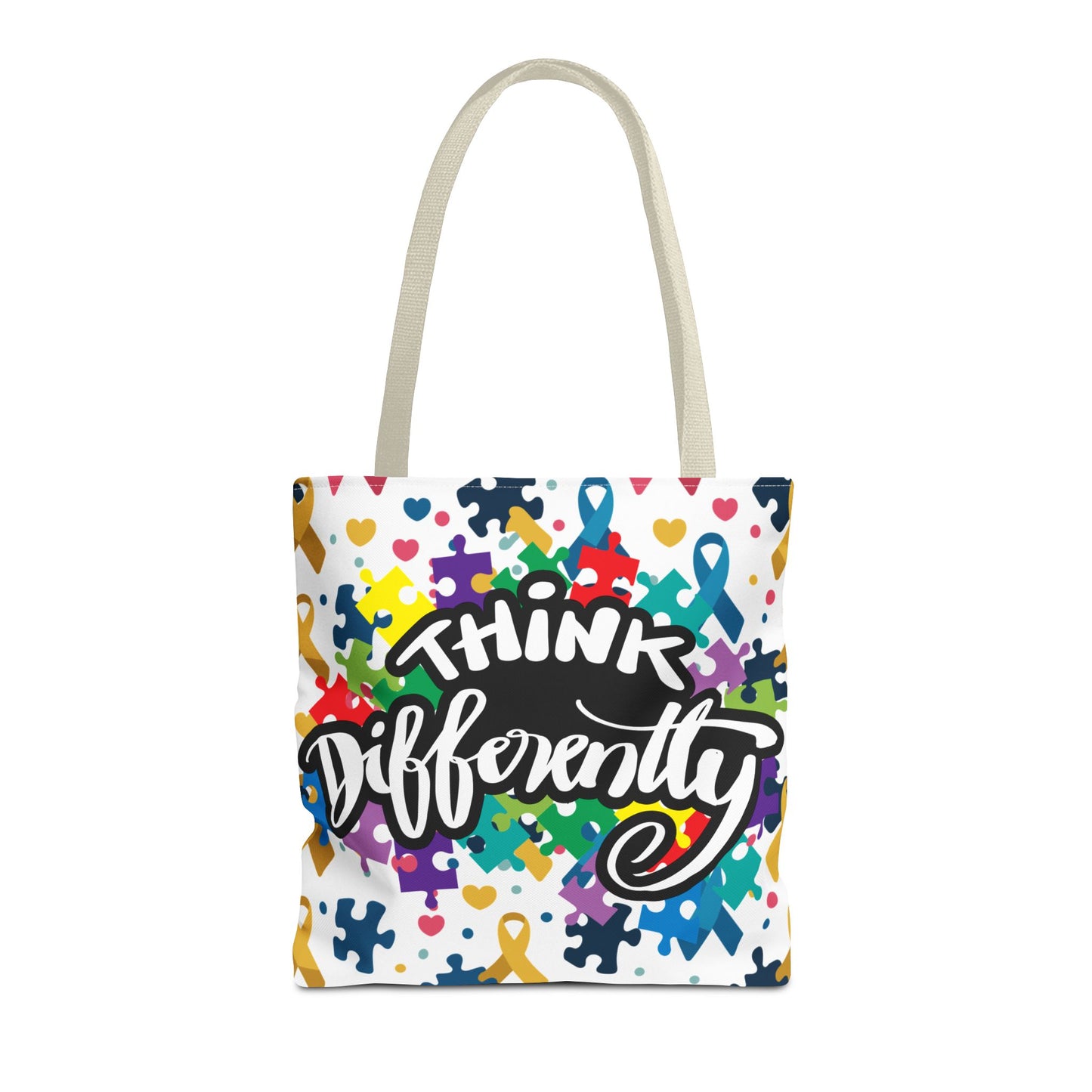 Colorful puzzle ribbon design on Think Differently Autism Awareness tote bag by Printify, showcasing vibrant artwork.