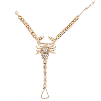 Faux diamond-studded scorpion anklet by Zendrop featuring silver-tone metal and intricate design on the ankle chain.