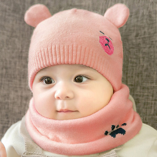 Ramshackle Shack hat and scarf set with cozy knit textures, featuring a stylish beanie and matching scarf in warm neutral tones.