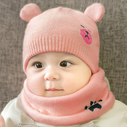 Ramshackle Shack hat and scarf set with cozy knit textures, featuring a stylish beanie and matching scarf in warm neutral tones.