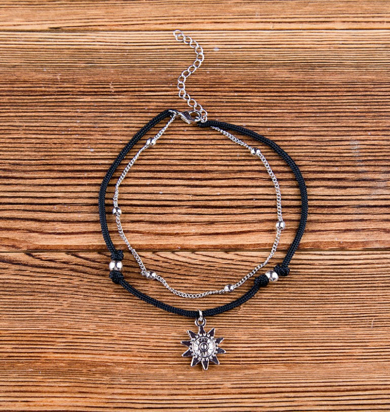 Vintage elephant anklet and bracelet set by Zendrop, featuring intricate metalwork and elephant charm details.