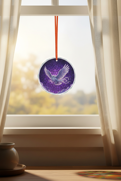 Owl suncatcher ornament hanging in home window with sunlight
